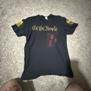 Black Graphic T-Shirt with Yellow and Red Design